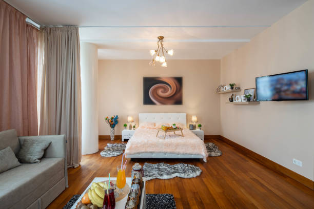 istock Modern interior of studio apartment. King-size bed. 1189184668