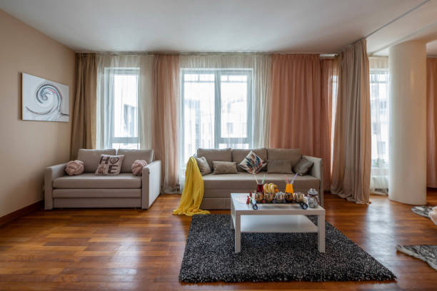 istock Modern interior of living room. Cozy sofas. 1189184682
