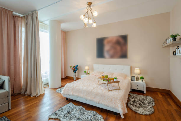 istock Modern interior of studio apartment. King-size bed. 1189184714