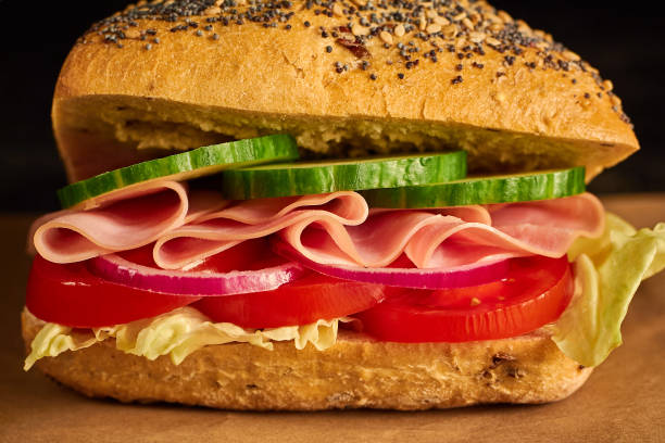 istock Sub sandwich with ham and fresh vegetable. 1189184937