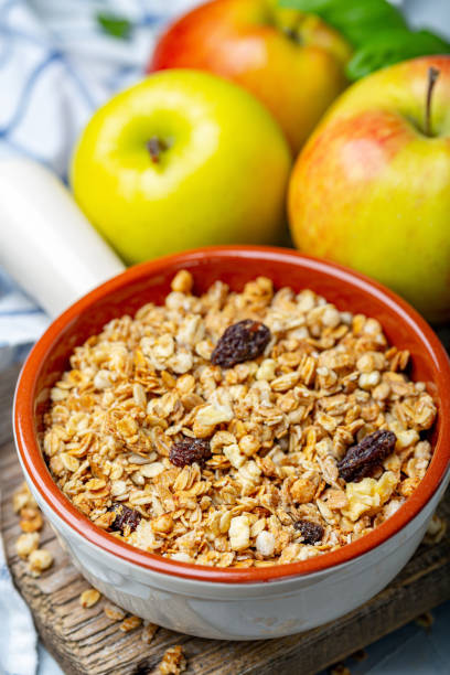 istock Homemade granola with apples and raisins. 1189186819