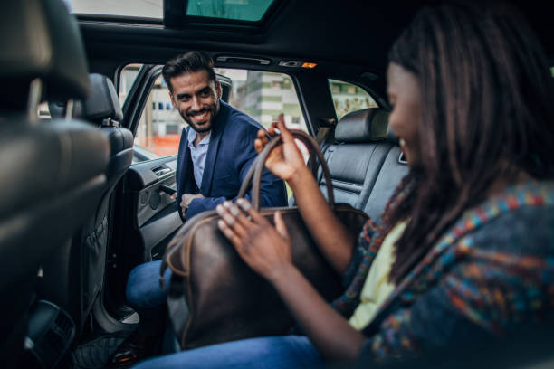 istock Cheerful people in a car 1189187797