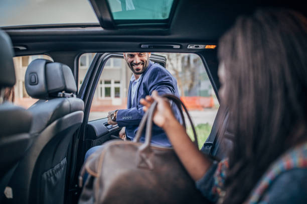 istock Businessman entering a car 1189188208
