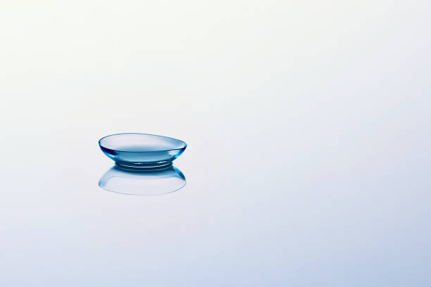 istock Contact lenses on light blue background 1189188257