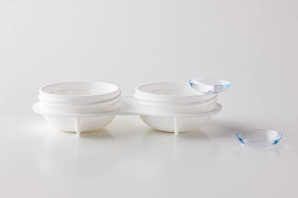 istock Contact lenses and case on white background 1189188828