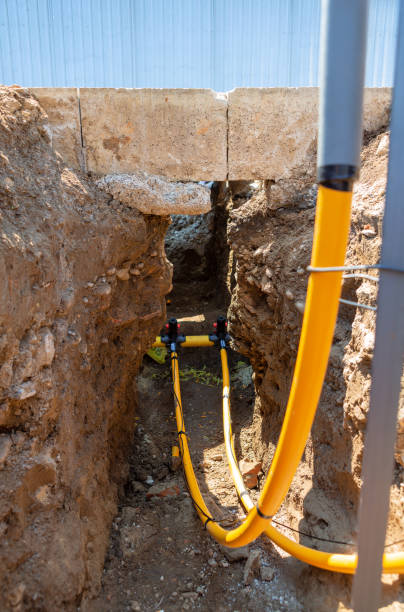 istock Main gas pipe and two connections with signal cables connected using fittings for electrofusion welding. Electro fusion is a method of joining MDPE, HDPE and other plastic pipes together by melting. 1189192025