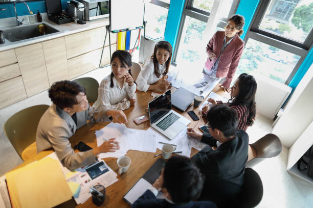 istock Group of business persons in discussion 1189192285