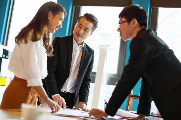 istock Group of business persons in discussion 1189195819