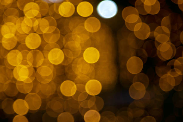 istock Defocused yellow gold Christmas lights bokeh 1189195937