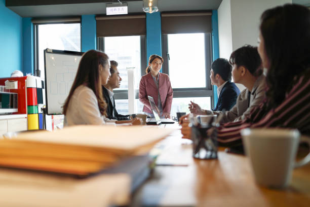 istock Group of business persons in discussion 1189197435