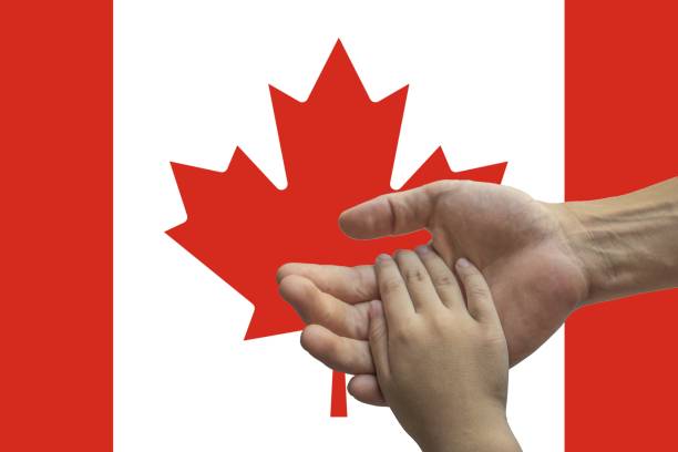 istock Canada flag, intergration of a multicultural group of young people 1189203254
