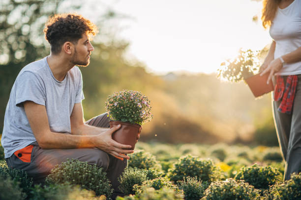istock Man and woman working in garden 1189203456