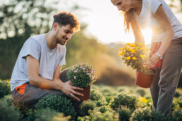 istock Man and woman working in garden 1189203547