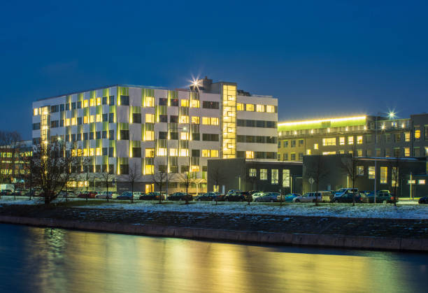 istock Modern design of the building. Modern architecture. Snow on the ground. 1189205179