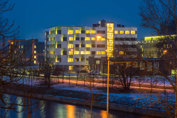 istock Modern design of the building. Modern architecture. Snow on the ground. 1189205205