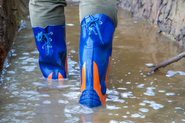 istock Safety rubber boots for the woodcutter. 1189205557