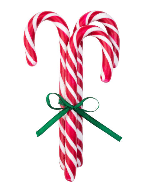 istock Red striped caramel sticks tied with a green bow 1189208477