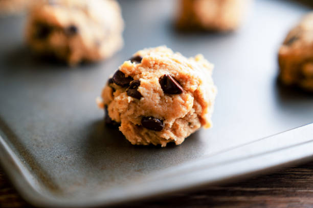 istock Oatmeal, Peanut Butter, chocolate chip cookies, ready to bake 1189210117