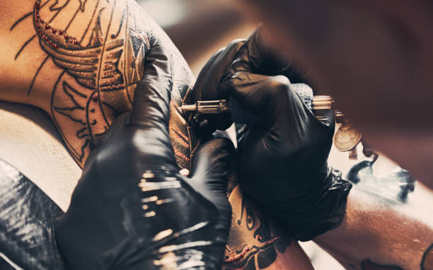 istock Close-up of tattoing a shoulder 1189211282