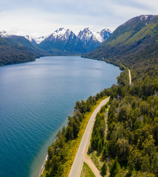 istock Bariloche road by lake, mountain range with snow, Argentina 1189212634