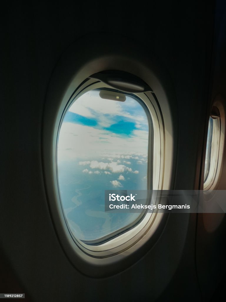 Plane Window View Rba Aiplane Windows View On Bly Sky And Clouds From The Cabin Stock Photo ...