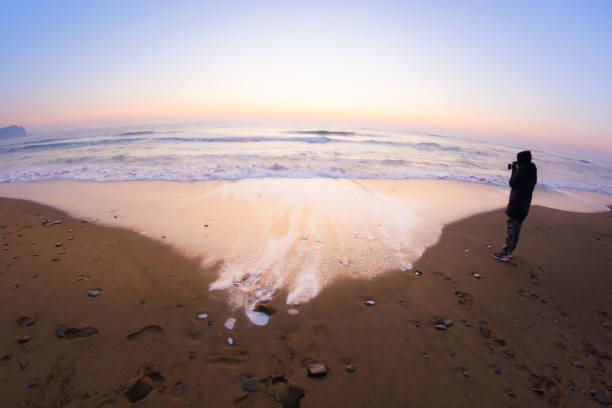 istock Dawn by the sea 1189213429