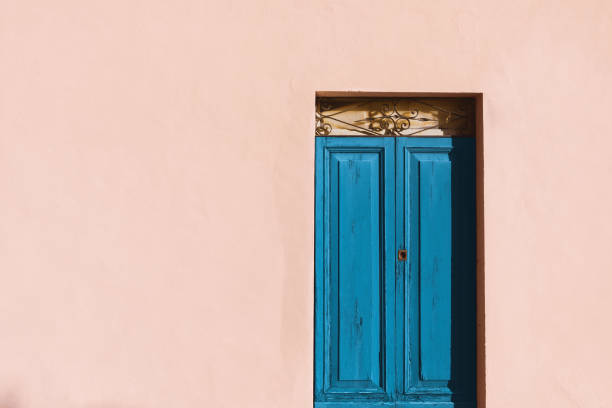 Old house with blue door, front view