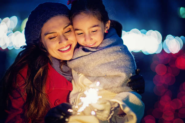 istock Mother is hugging her daughter at Christmas 1189218063