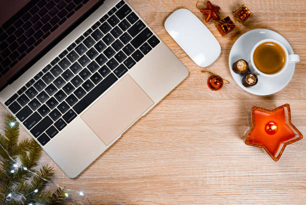 istock wooden desk with laptop and objects for mock up template design 1189222688