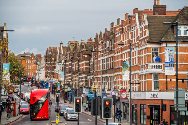 Busy street in South West part London London, United Kingdom -  October 2019 : Traditional English architecture on a busy street in Streatham borough district type photos stock pictures, royalty-free photos & images