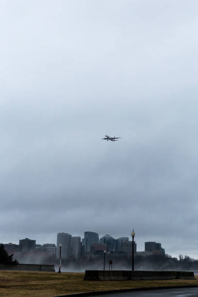 Small propeller airplane approaching the Quebec city airport during autumn day.