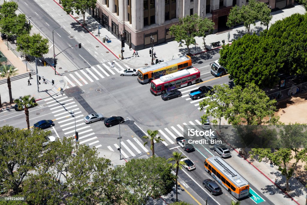 Traffic in Los Angeles, Aerial View Street scene in Los Angeles, car speeding in downtown district, aerial view, USA. Bus Stock Photo