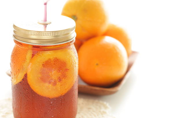 istock Freshness orange and jar drink tea 1189226895
