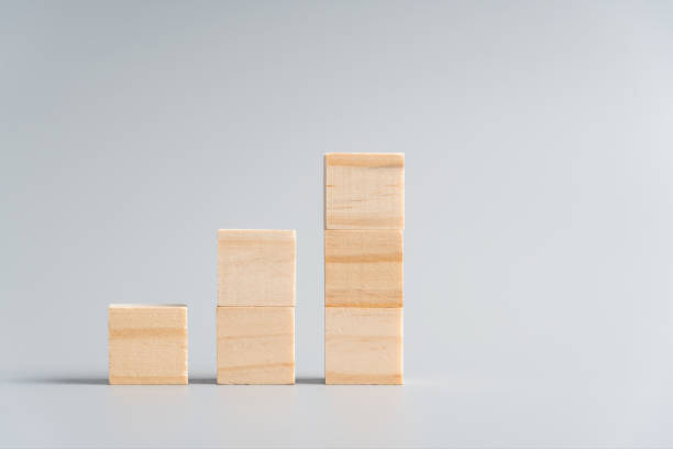 istock blank wood cube mock up in stair shape or graph on isolated background for create letter or symbol, business, banner, advertising concept, banner size with copy space 1189232424