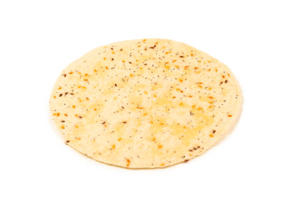 istock Pitta bread with seeds isolated on white 1189234670
