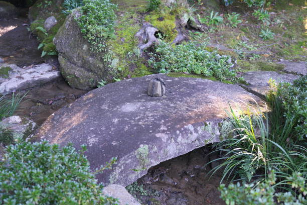 Atami, Japan-June 15, 2021: A view of Kosawa Yu, a tourist attraction in Atami City, Shizuoka Prefecture. It is one of the seven hot springs in Atami, which is the source of hot springs in Atami City, and you can make hot spring eggs with this hot spring.