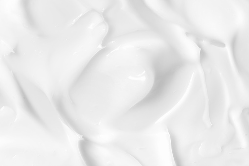 White cosmetic cream, body lotion, moisturizer, face mask texture background. Skin care product macrophotography
