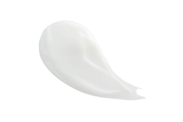 istock Beauty cream smear isolated on white 1189235675