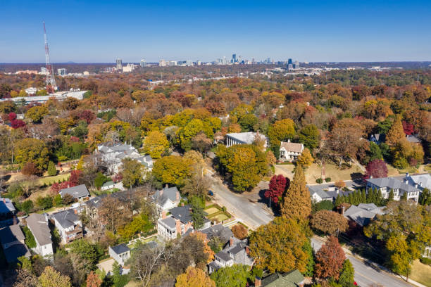 Aerial picture of houses in Midtown Atlanta during the fall with Buckhead buildings in the background stock photo