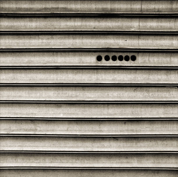 Security Shutters with holes for seeing out.