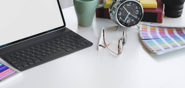 istock Cropped shot of modern designer workspace with mock up tablet and copy space 1189260694