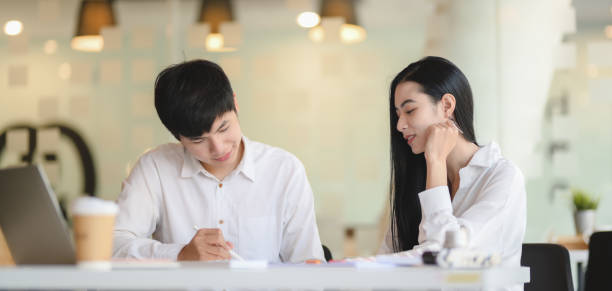 istock Young passionate designer team exchanging the ideas about new projects together 1189260777