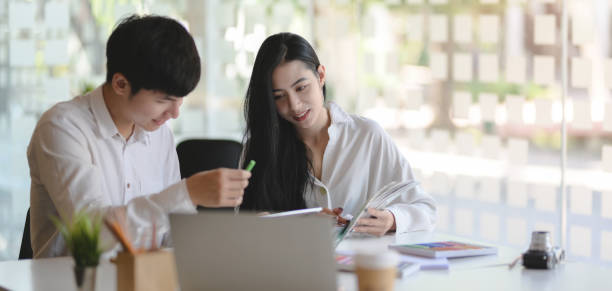 istock Young passionate designer team exchanging the ideas about new projects together 1189260924