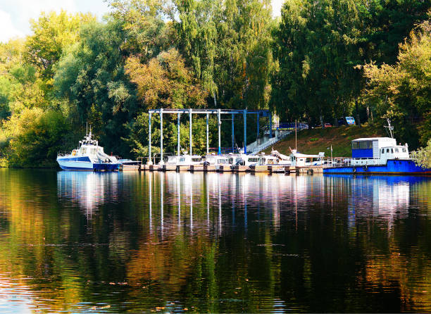istock Dramatic boat pier at Moscow autumn river background 1189265143