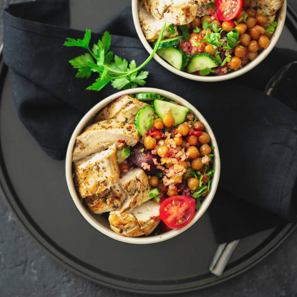 istock Two bowl buddha. Healthy eating plate top view on dark background copy space 1189269799
