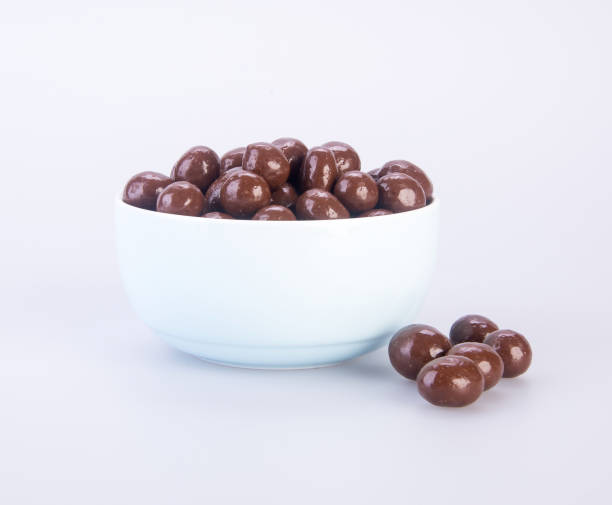 istock chocolate balls in love shape on a background. 1189270689