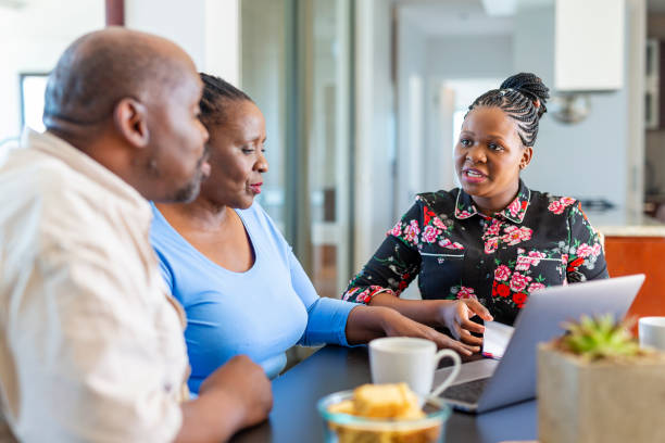 istock Senior African Couple Getting Retirement Financial Advice 1189277111