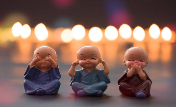 Monk Bab The mong dolls are molded using hand action close ears,eyes and mouth. 3 monkey concept buddha photos stock pictures, royalty-free photos & images