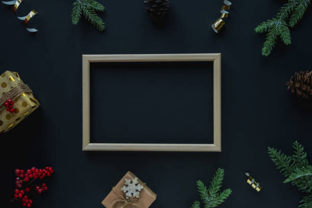 istock Frame on dark background surrounded by Christmas decorations 1189291465