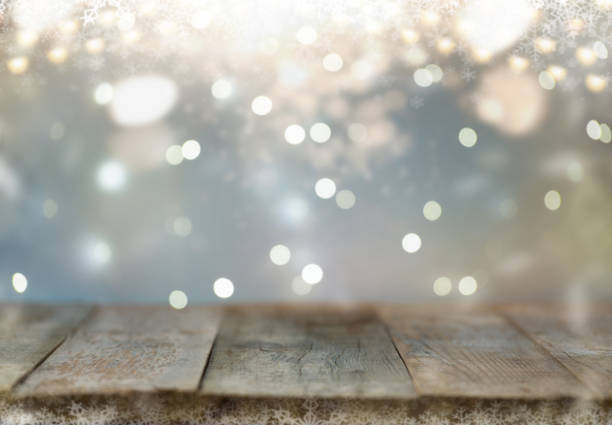 istock Wooden table  with blur ligh 1189296914